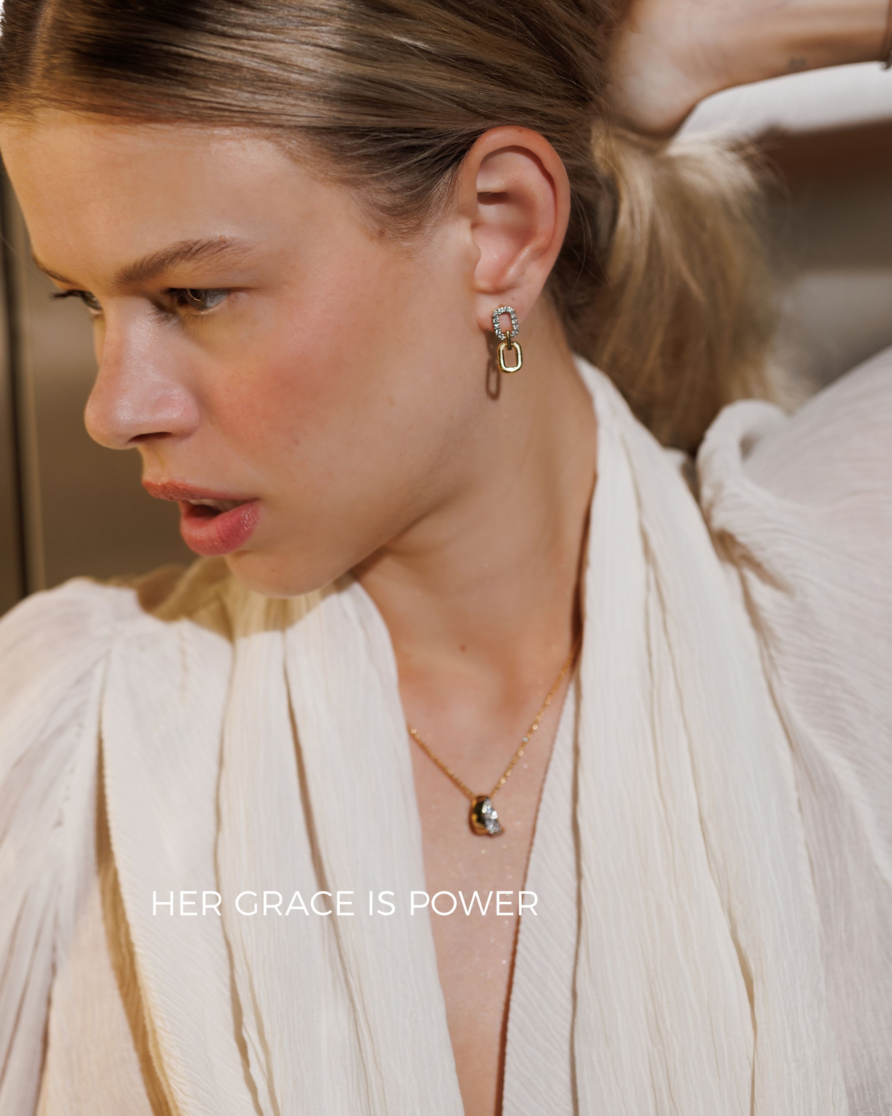 SHE DOESN’T ASK FOR ATTENTION, SHE HAS IT ✨

Her grace is power. Her class is her signature. And her jewelry? Never an afterthought.

The DUO CRYSTAL LINK EARRINGS and DUO CRYSTAL NECKLACE bring together bold golden links and crystal sparkle polished, confident and made for the woman who knows exactly who she is.

No loud entrance required. The details already said enough.

DUO CRYSTAL by CAJOY✨
